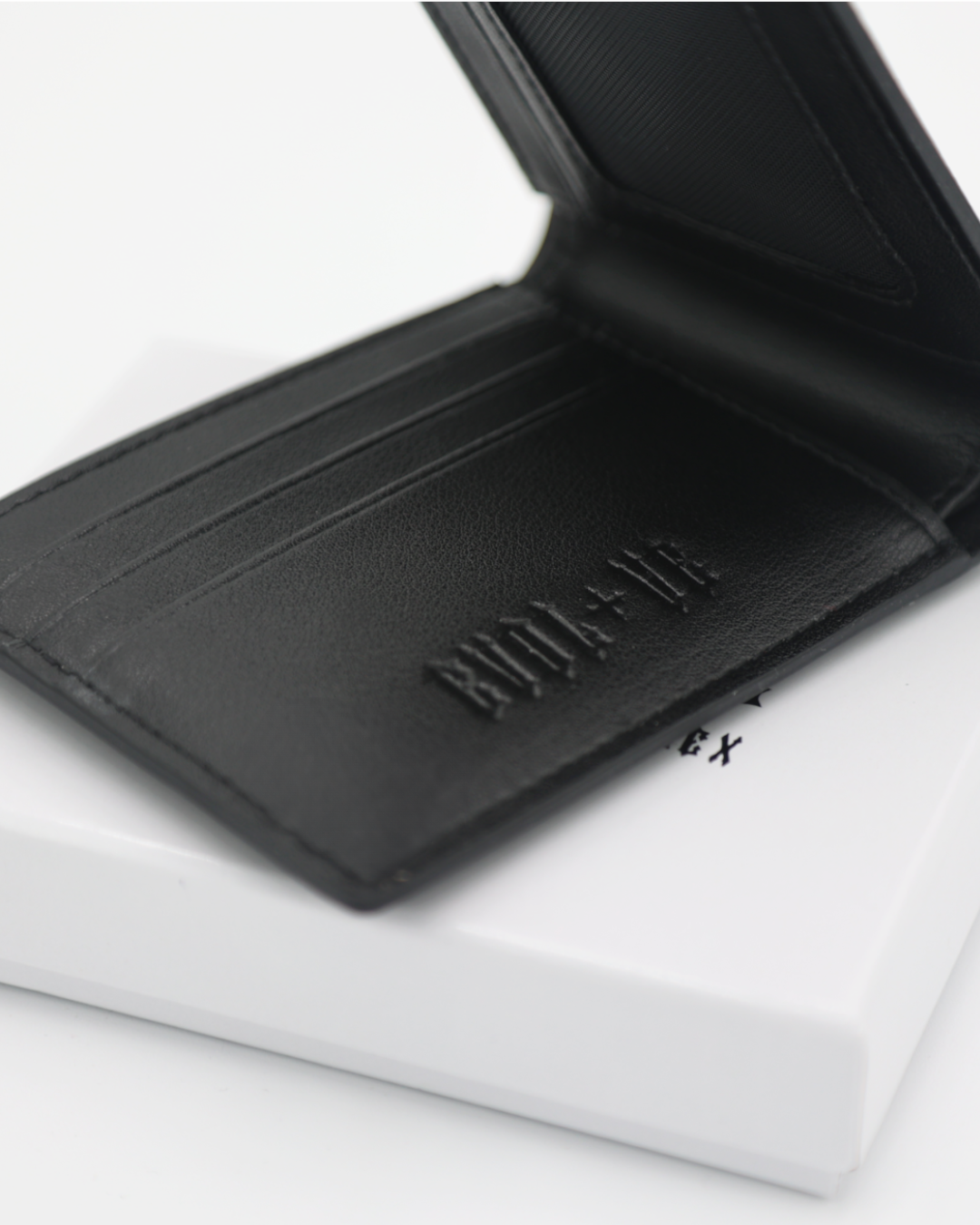 EVOL+VE '+' LOGO LEATHER BI-FOLD WALLET BLACK