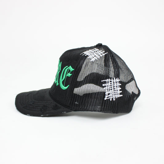 PAIN IS PURE 'PURE' LOGO NEEDLE REPAIR TRUCKER HAT BLACK/GREEN